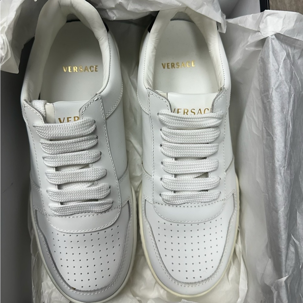 Classic white sneakers sold off line